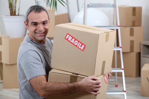 Packing boxes for a home move in Sutton