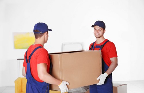 Professional Sutton removals company handling packed household boxes