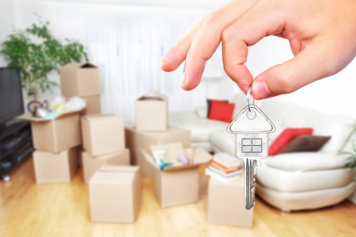 Student boxes and furniture prepared for transport in Sutton