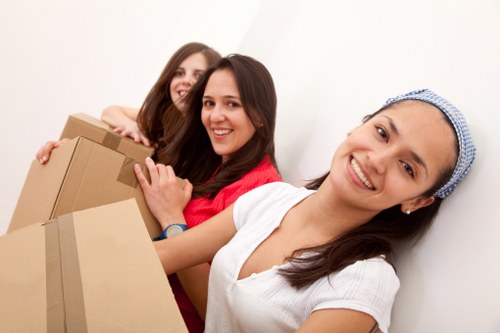 Packed boxes and furniture prepared for removal in Sutton