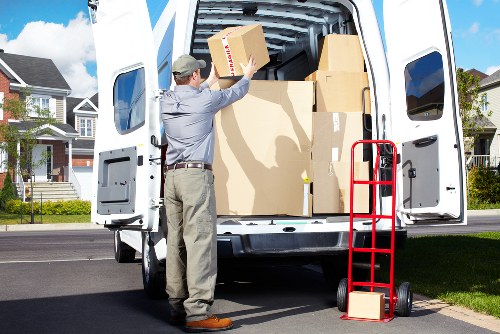 Staff using protective gear during a removals operation