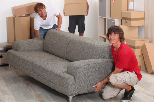 Boxes and furniture loaded into a moving vehicle
