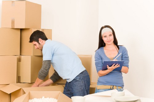 Furniture and boxes prepared for a Sutton office move